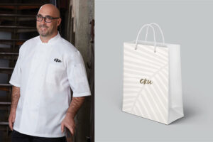 Oku restaurant uniform and takeout bag